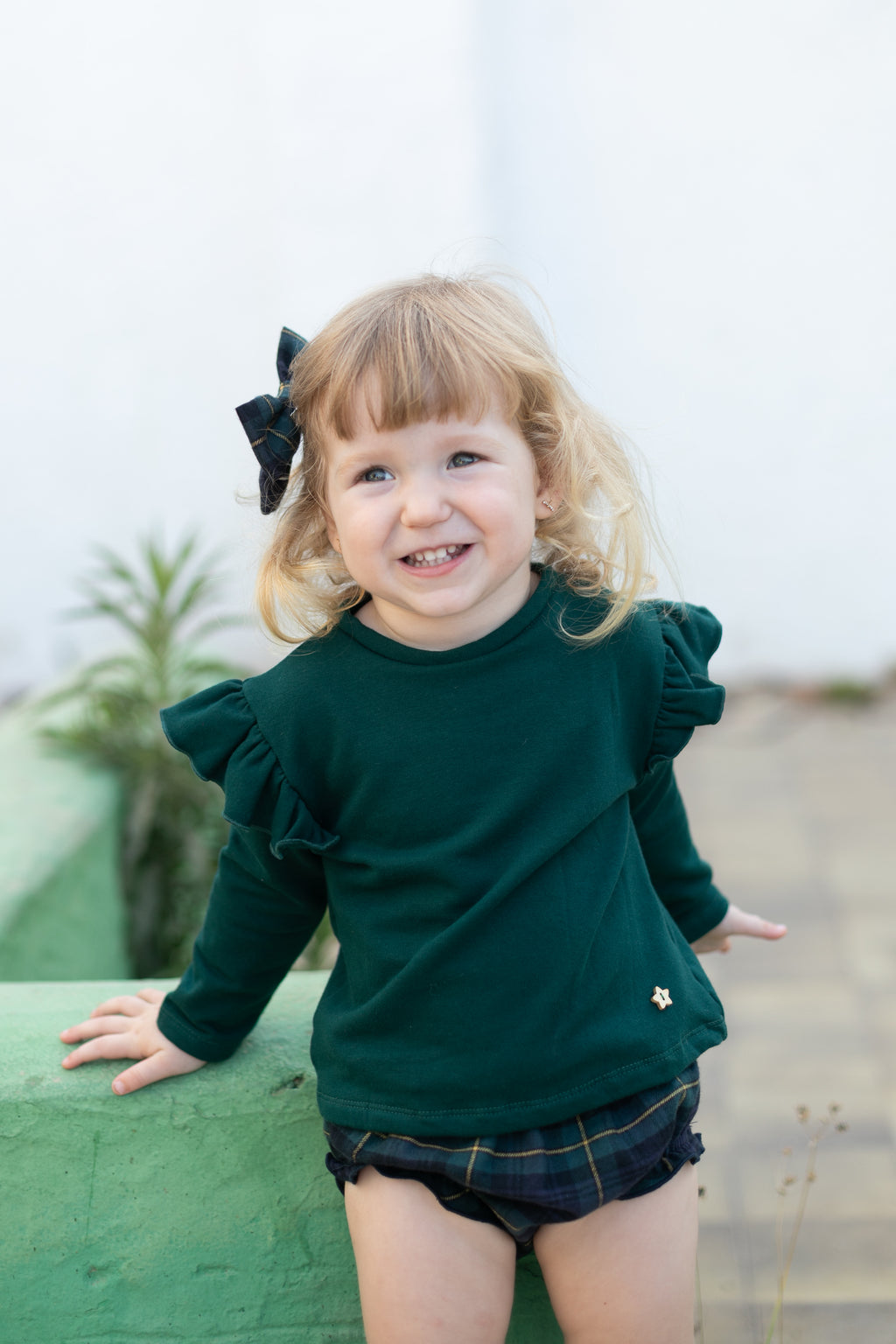 Sudadera verde botella volantes