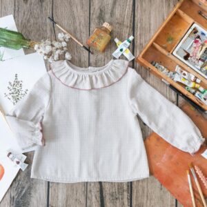 Camisa niña beige detalle rosa